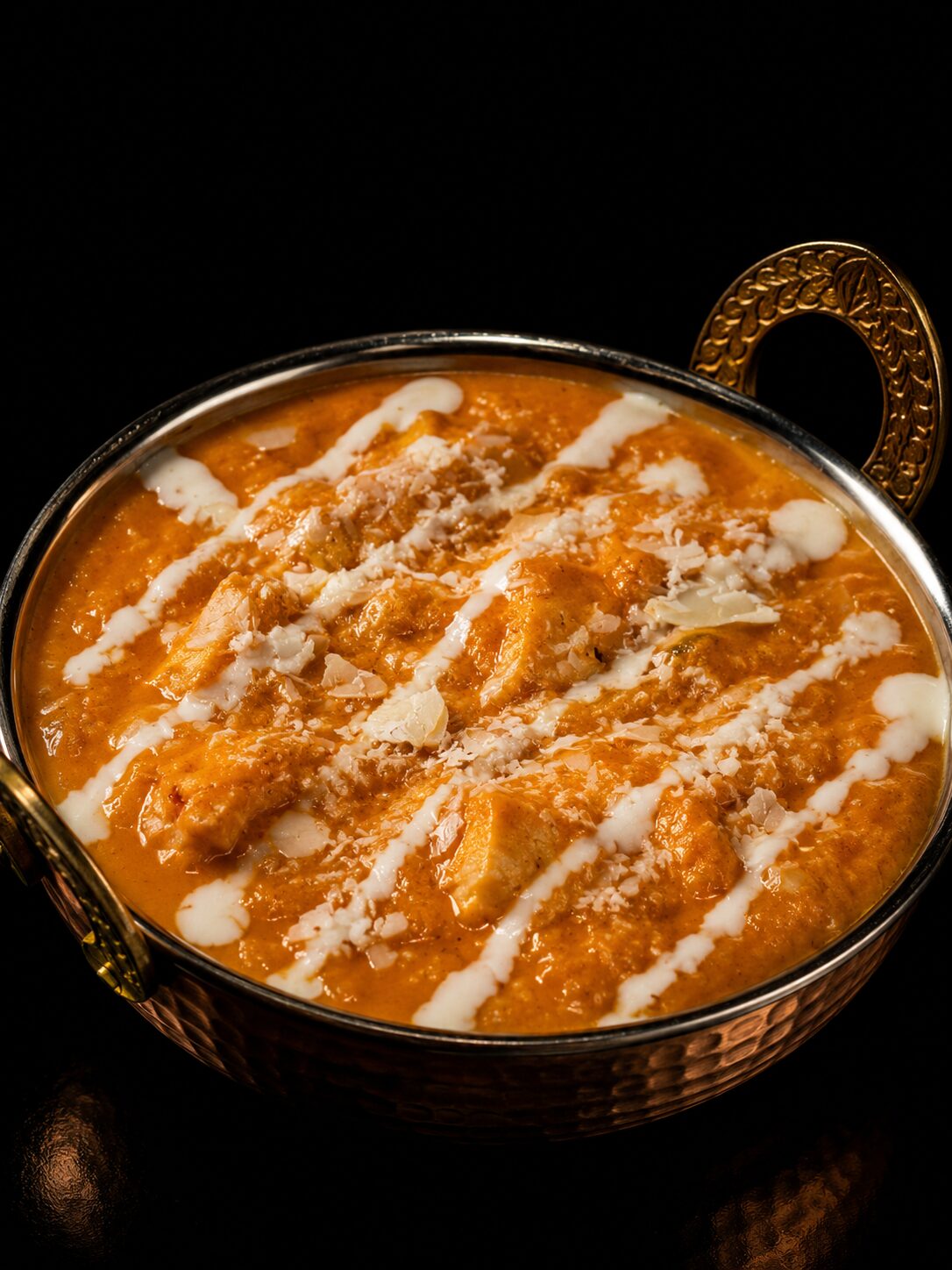 Zartes Chicken Mango Curry mit cremiger Mango-Kokos-Sauce im Shiva's Garden Indian Restaurant in Villingen.